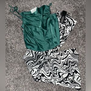 Flare leg pattern, jeans and strapped dressed tin top.Perfect forwestern fashion